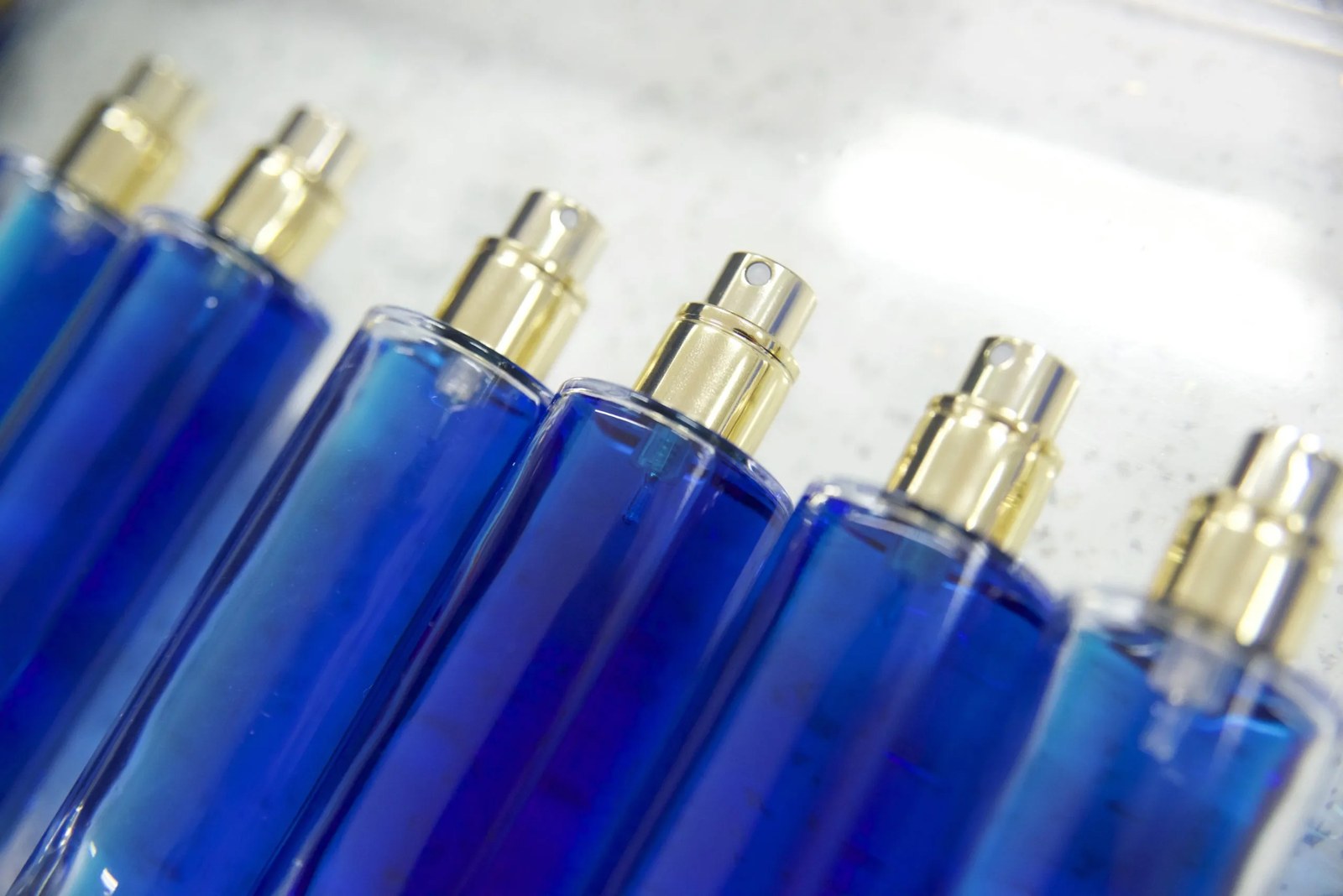 Leak-prevention testing — a lineup of filled mist containers